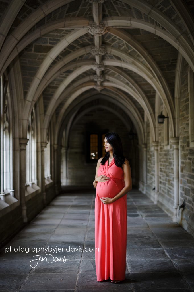 Pregnant woman in the portico hallway in Princeton