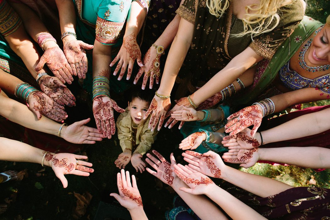 bridal party showing henna tattoos before wedding in New brunswick nj