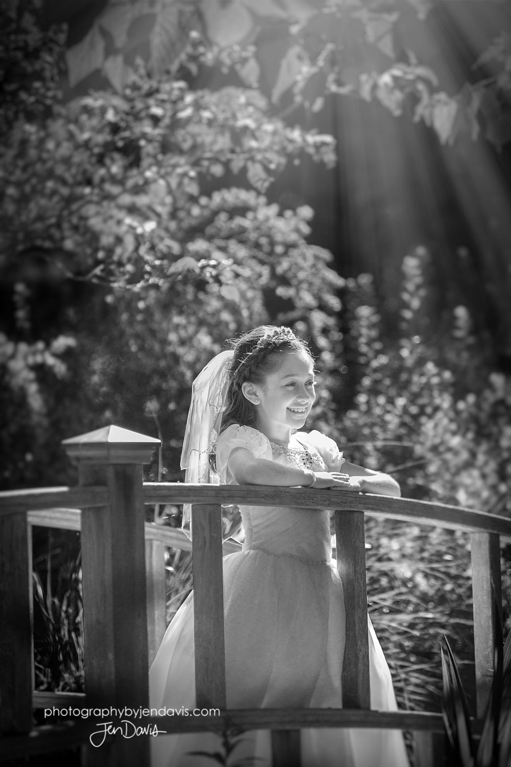 black and white of girl in first communion dress