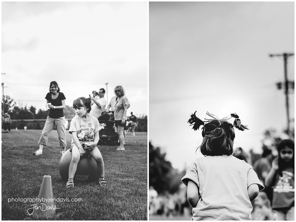 black and white of girl playing sports in field