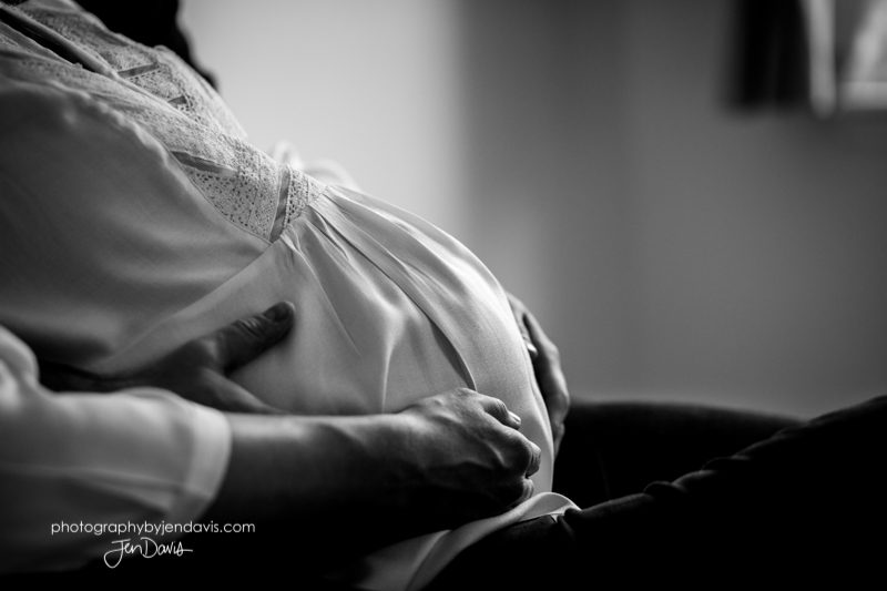black and white of pregnant belly