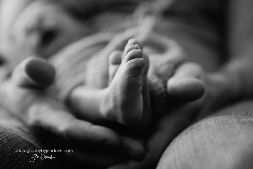 black and white of baby toes