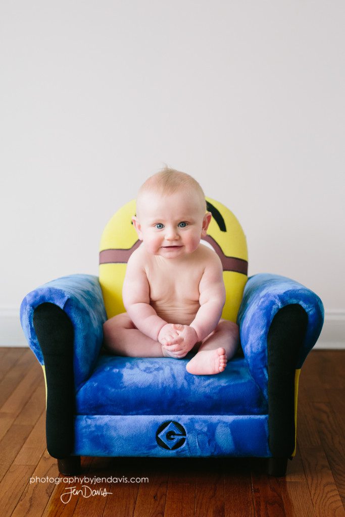 7 month old baby sitting in a chair