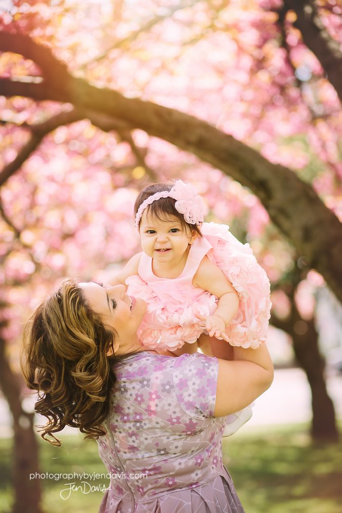 family photos with cherry blossoms in Princeton