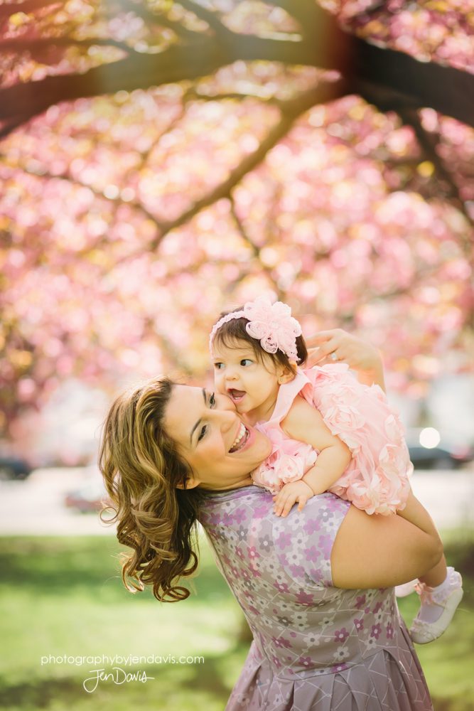 family photos with cherry blossoms in Princeton