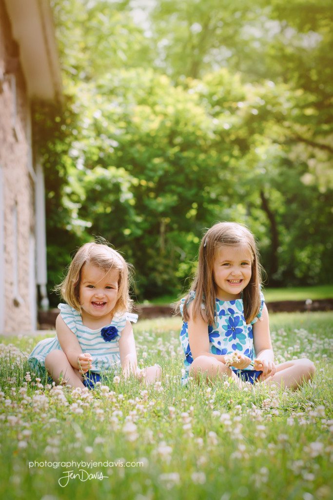 Little girls together in meadow