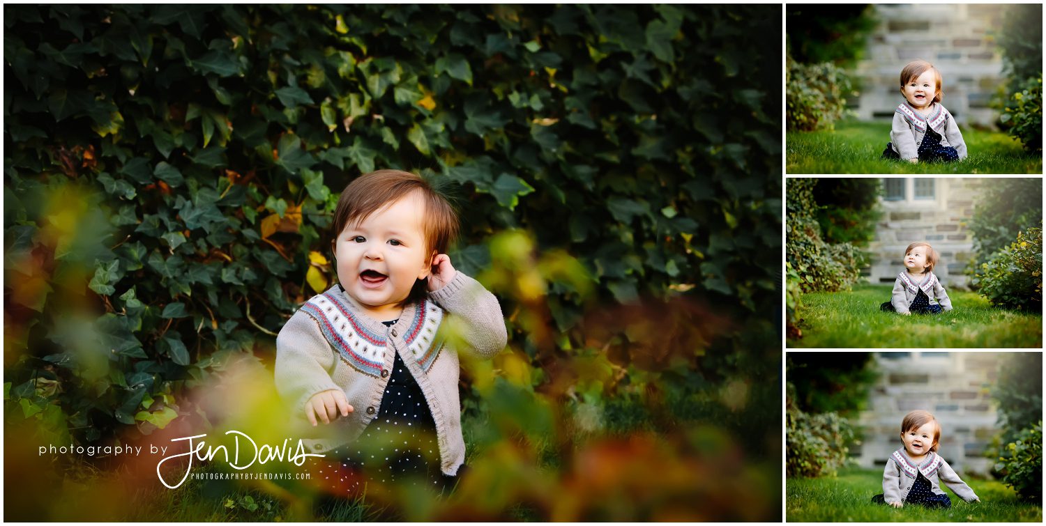 6 month old baby girl laughing and smiling in the grass
