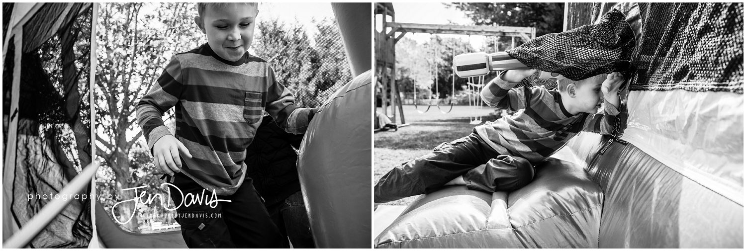 Black and White of a boy inside the inflatable