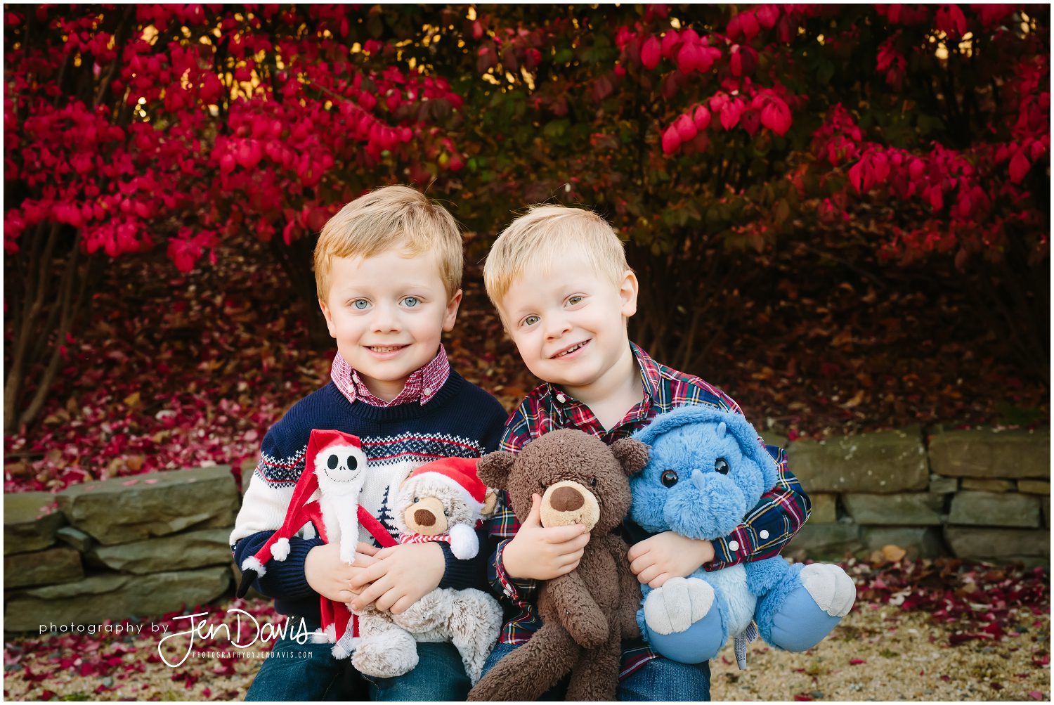 Little boys hugging their stuffed animals