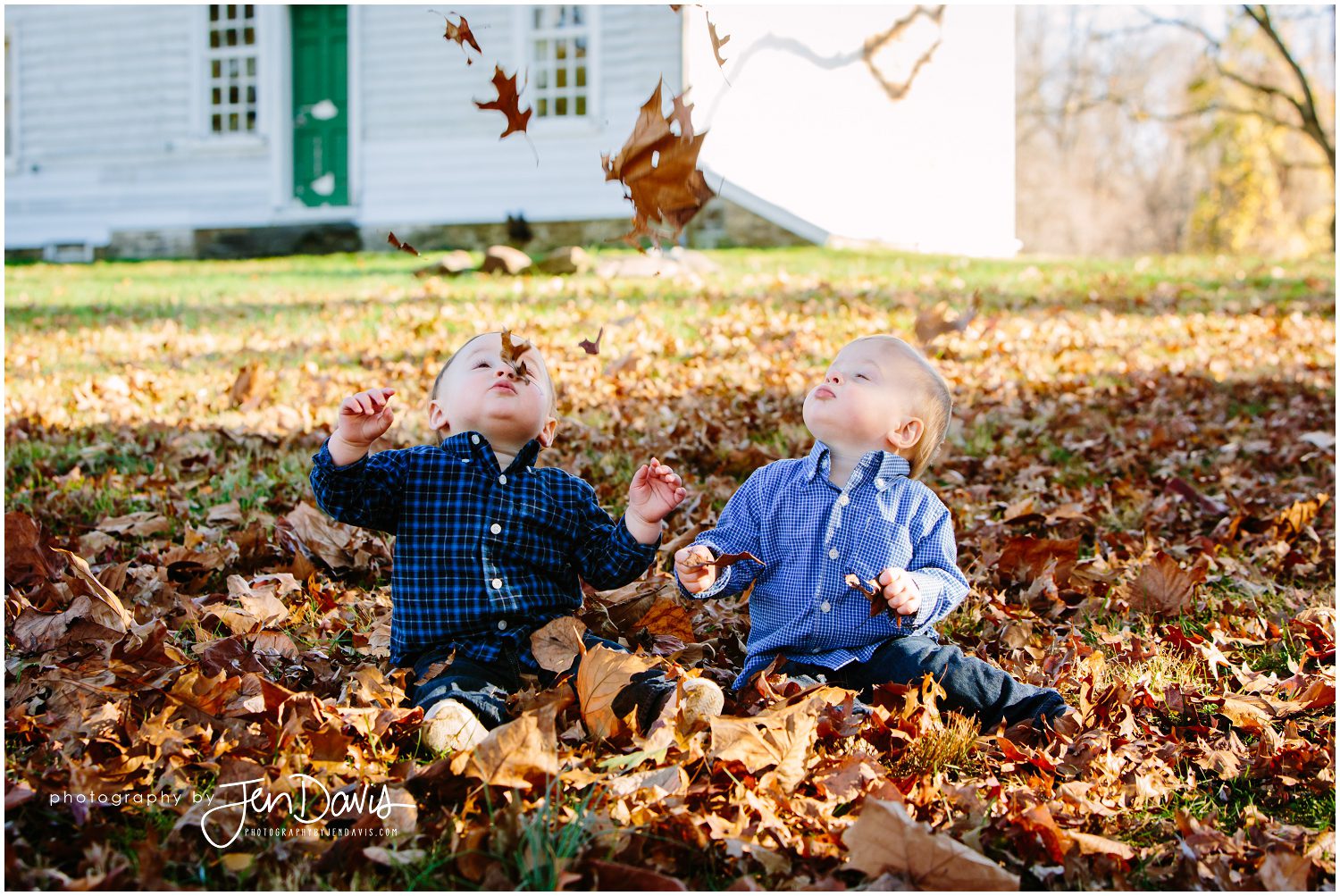 twins getting leaves play