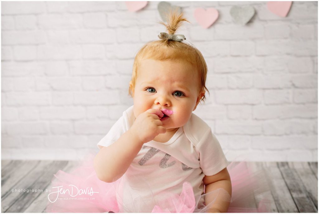 Girl first birthday cake smash pink silver