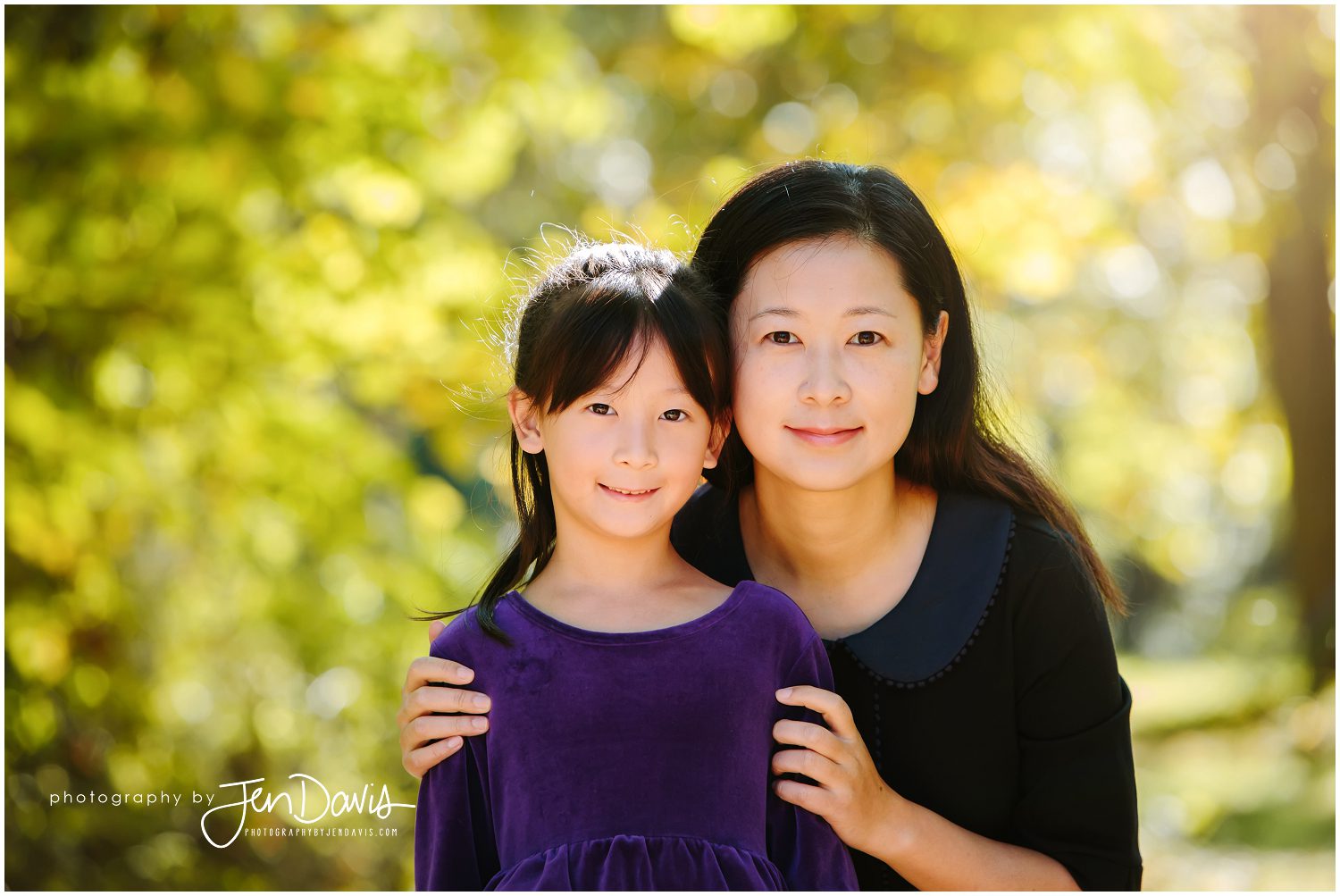 family smiling for pictures