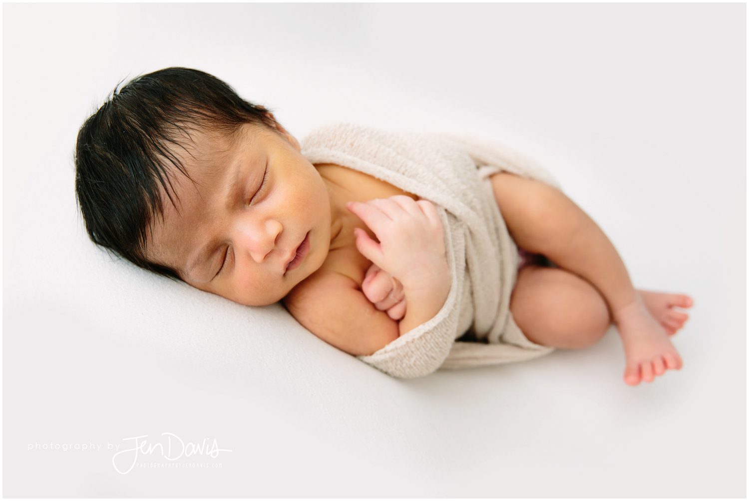 14 day old baby sleeping for portraits